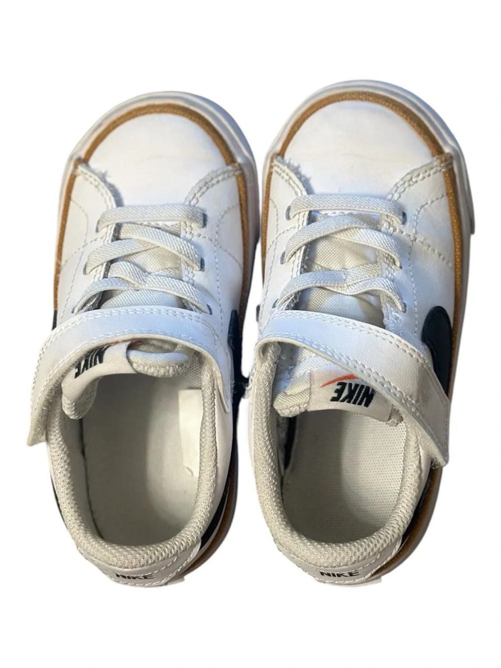 Nike Kids White Sneakers with Black Swoosh and Tan Accent